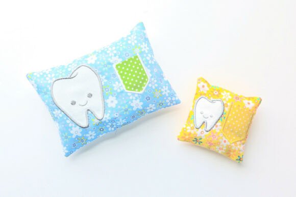 Pillow with Tooth Pocket ITH Applique